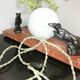 Lampe art déco marbre globe opaline et lévriers en régule, 1930