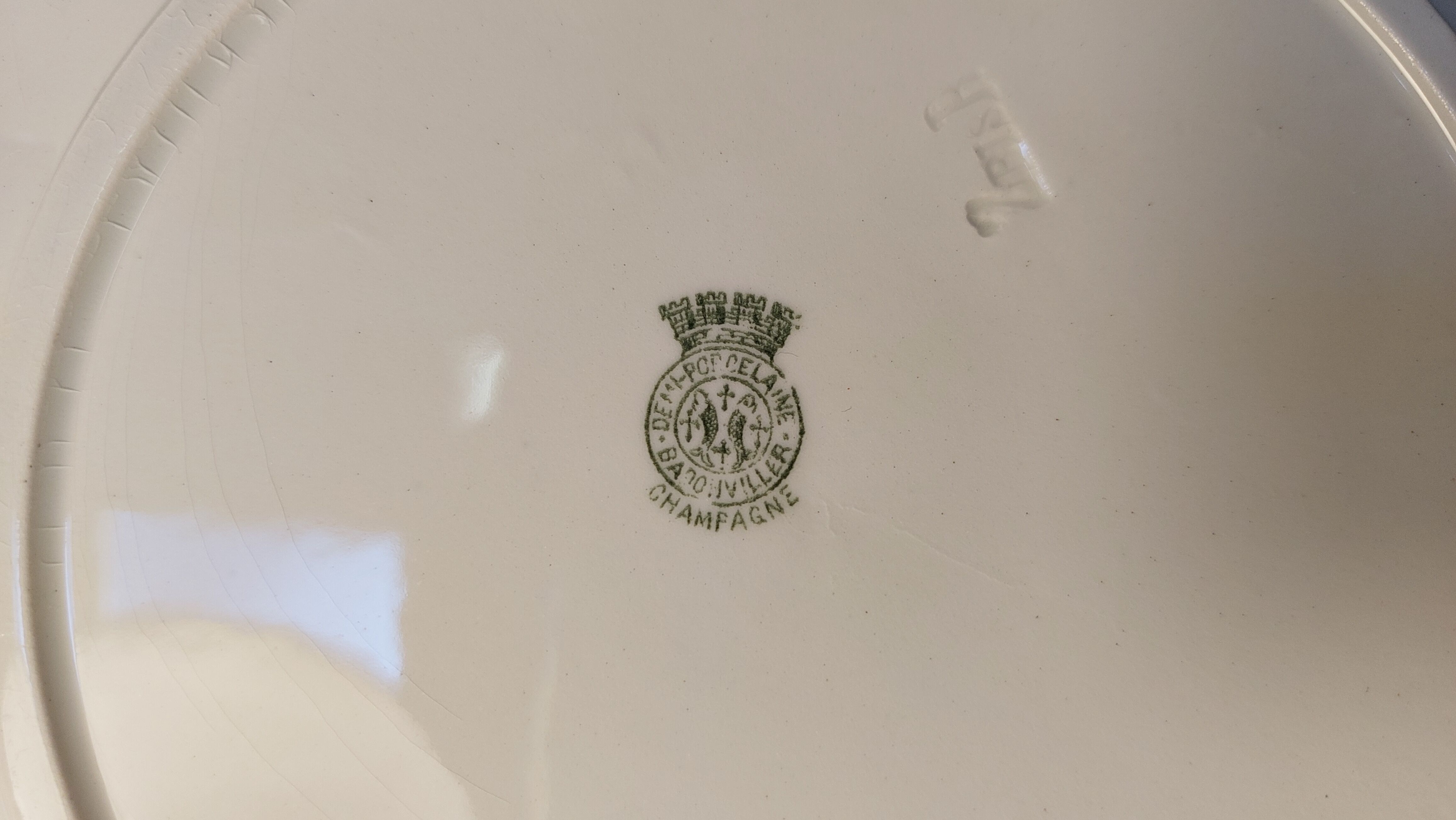 Set of 4 antique flat plates in half-porcelain from Badonviller
