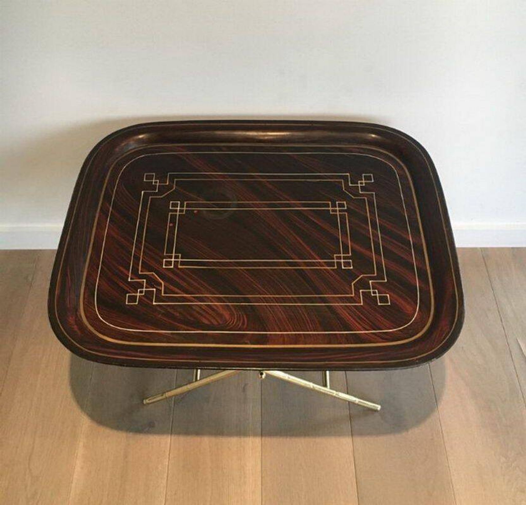 Beautiful table with a brass top and painted sheet metal
