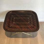Beautiful table with a brass top and painted sheet metal