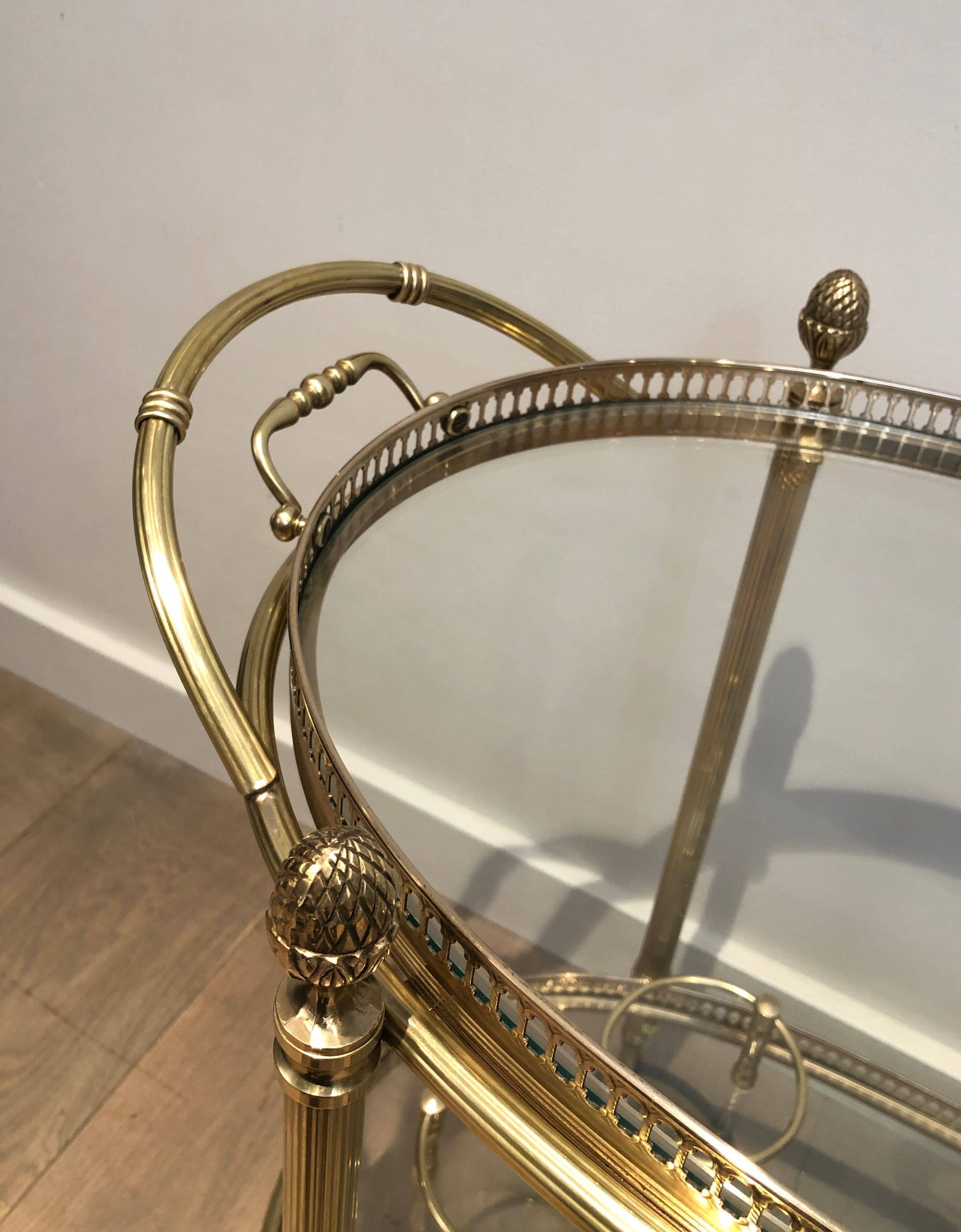 Oval brass trolley from Maison Baguès.