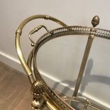 Oval brass trolley from Maison Baguès.