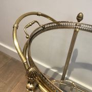 Oval brass trolley from Maison Baguès.