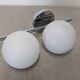 Double Space Age wall light in frosted white glass, France circa 1970.