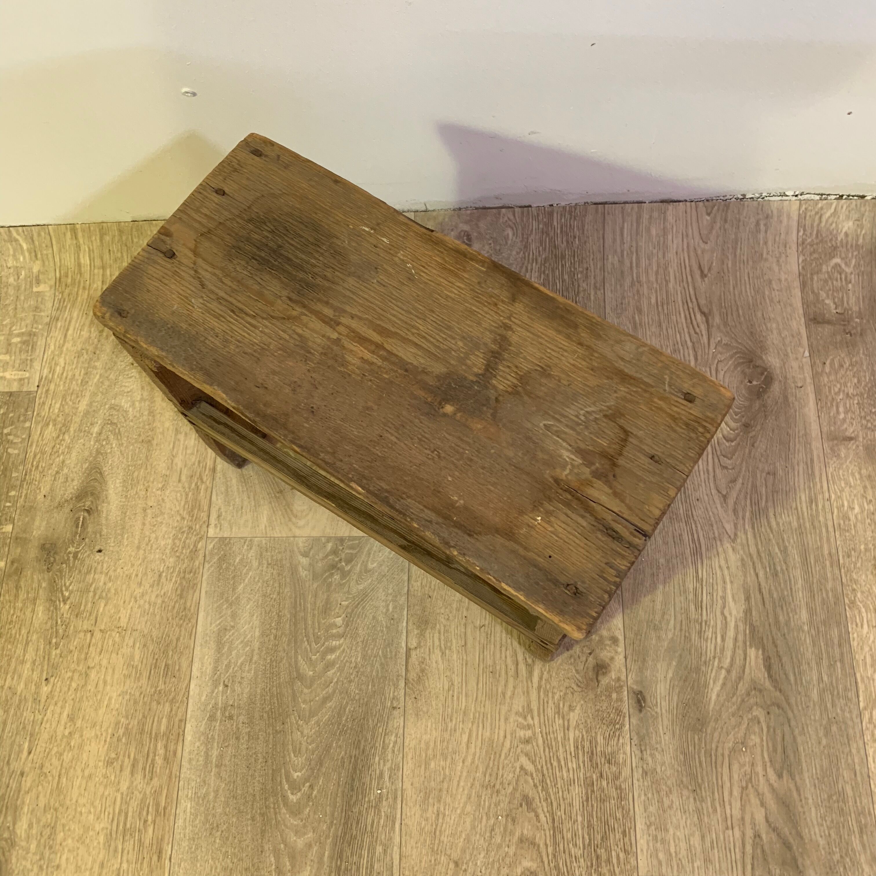 Old wooden foot foot stool