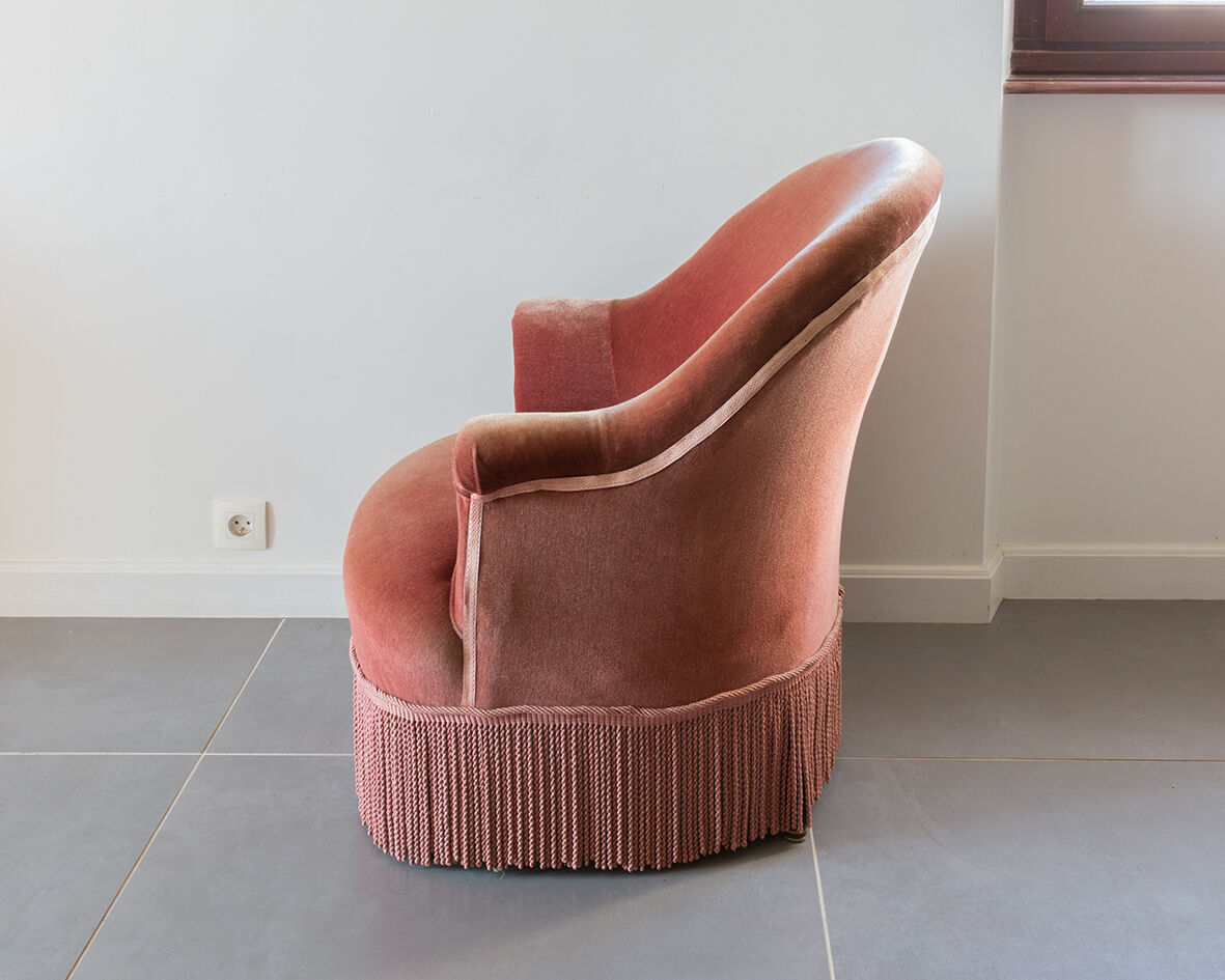 Old pink toad armchair
