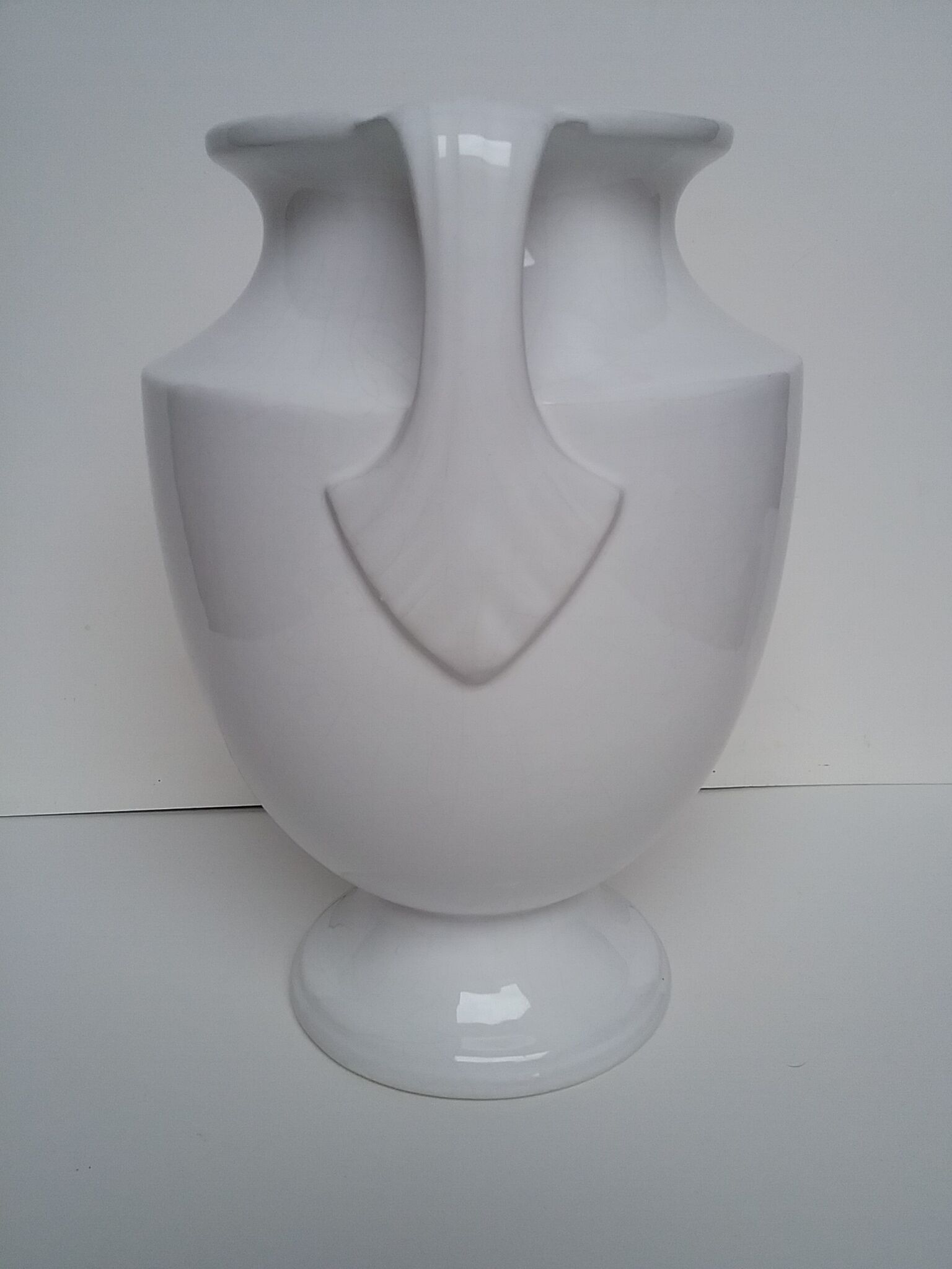 Cracked white ceramic vase