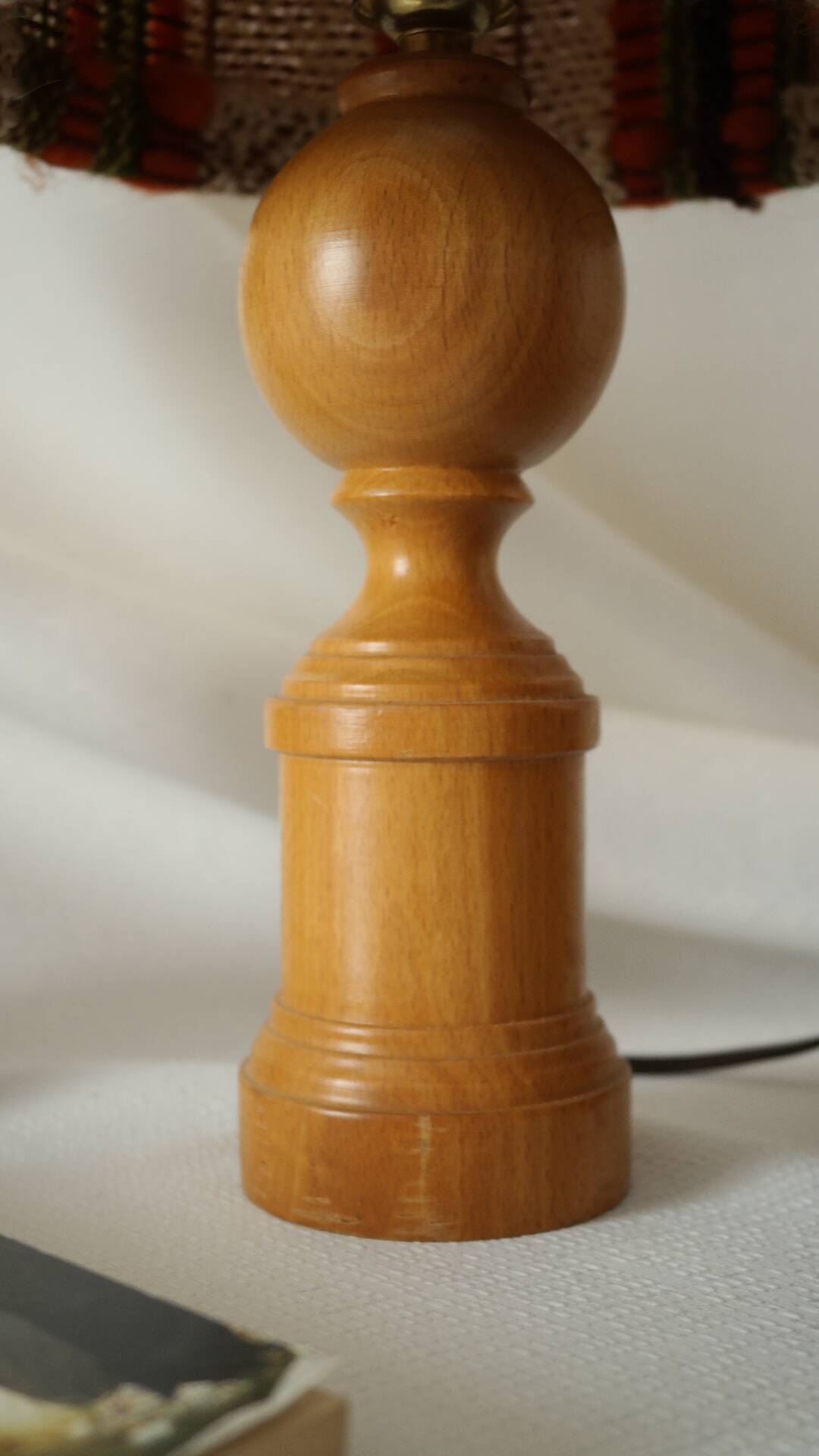 Vintage table lamp made of wood and knitted wool.