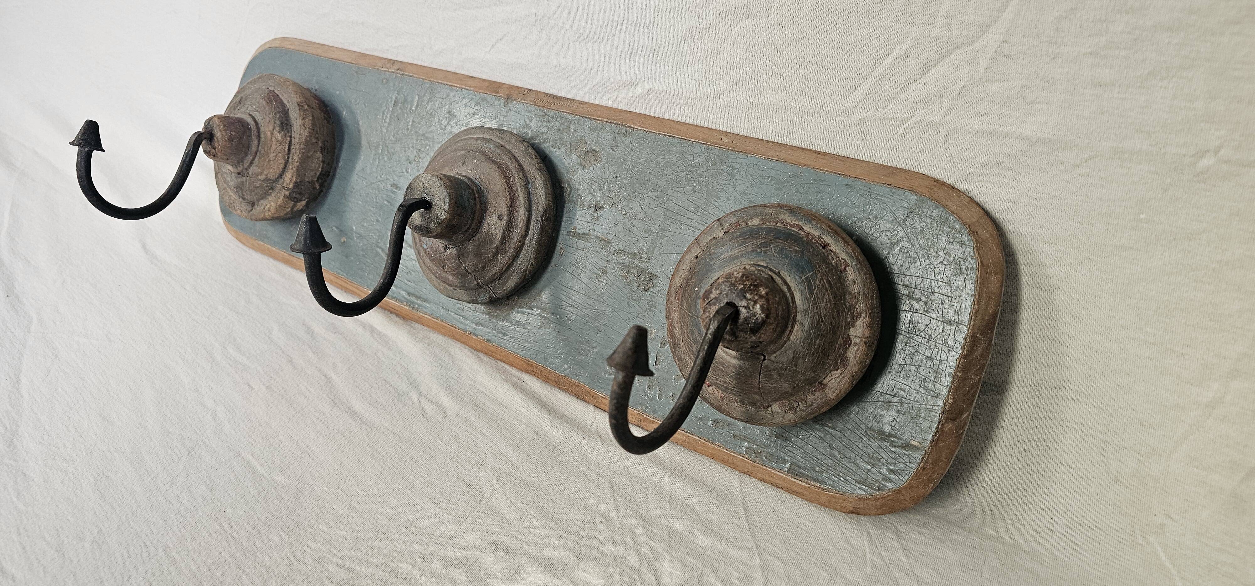 Antique teak coat rack with 3 wrought iron hooks