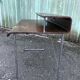 Design desk in formed glued laminated wood with chrome tubular base.