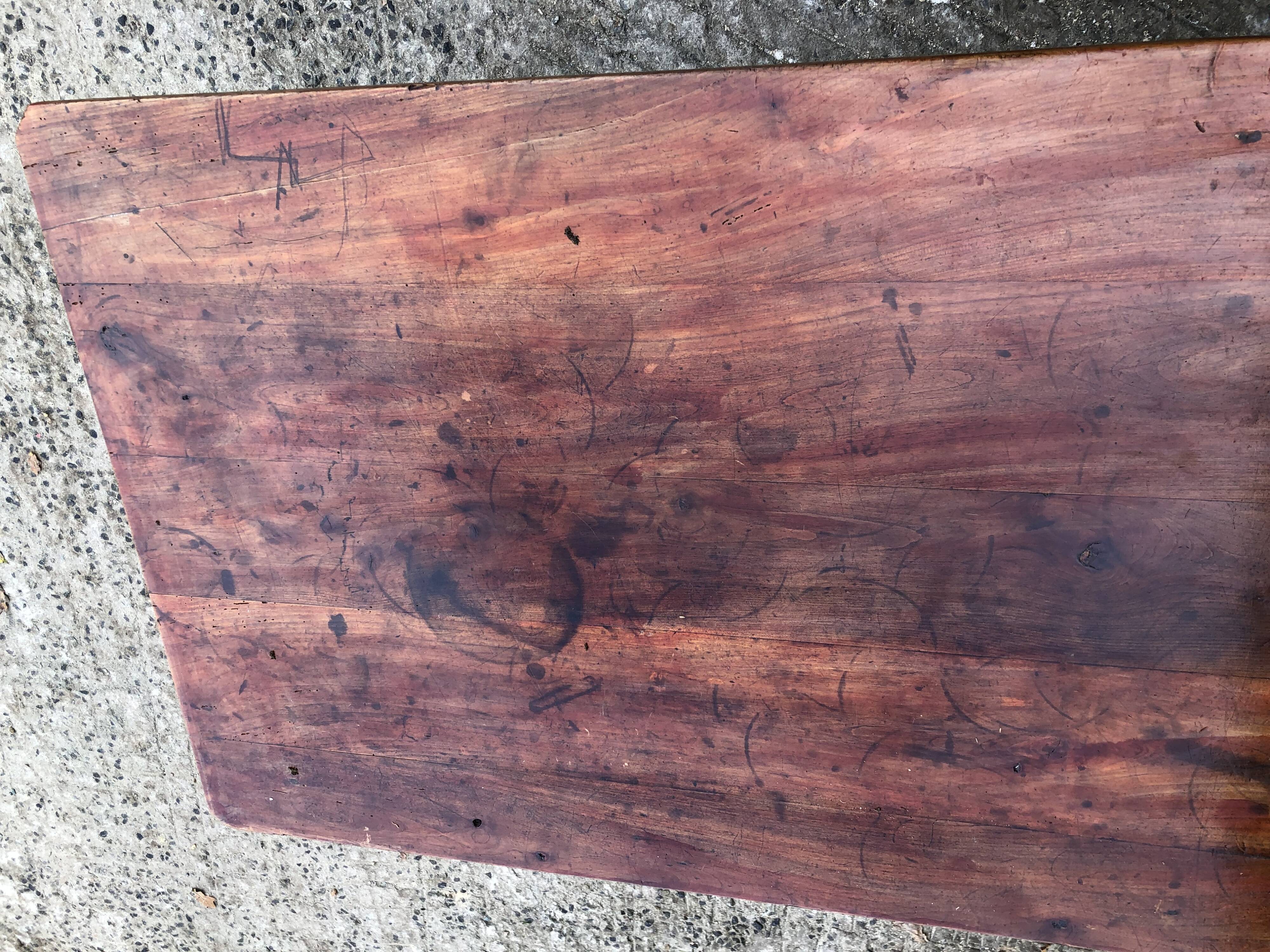 Old farmhouse table in solid cherry wood with 2 front drawers.
