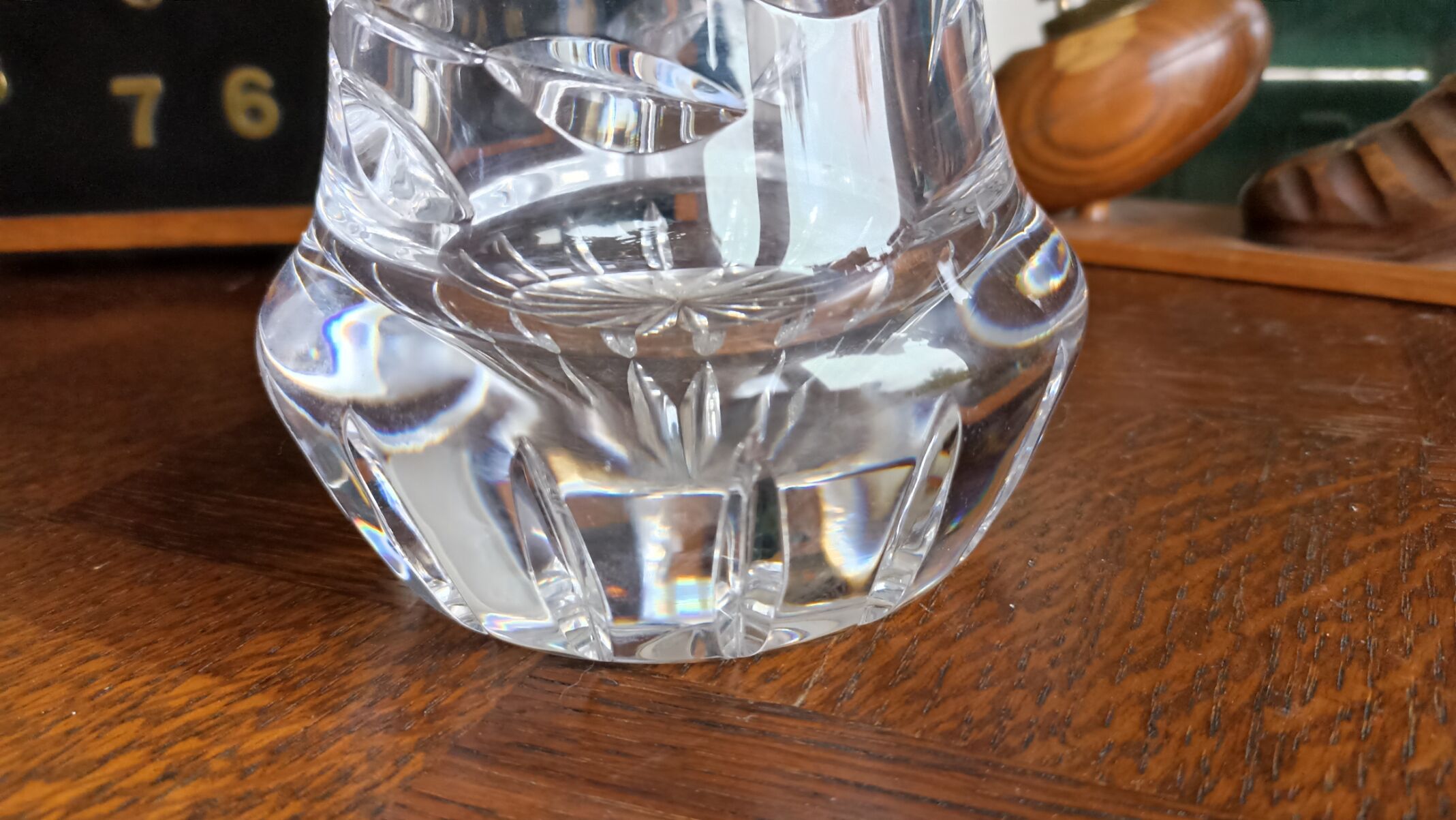 Carved solid crystal vase, floral decoration