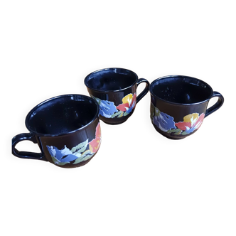 3 black Arcoroc cups with flower pattern.