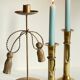 Trio of vintage knotted candlesticks brass