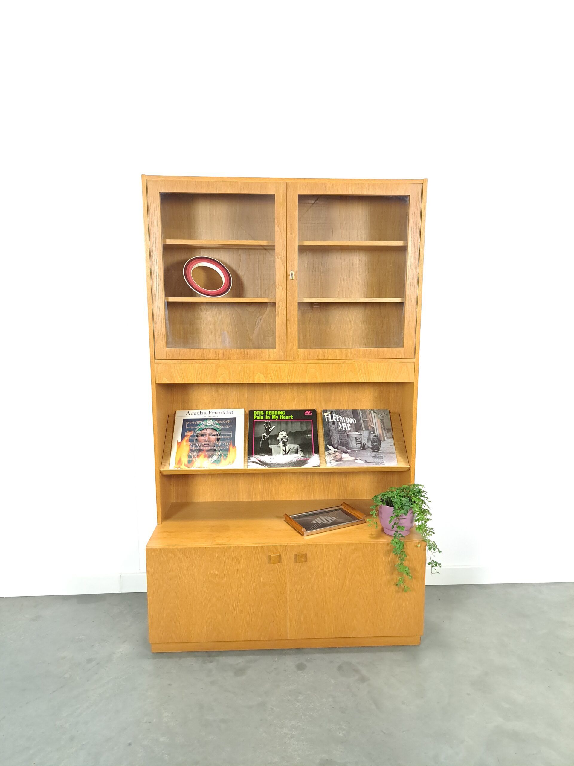 Tall LP display cabinet with glass doors and magazine shelf from Sweden