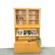 Tall LP display cabinet with glass doors and magazine shelf from Sweden