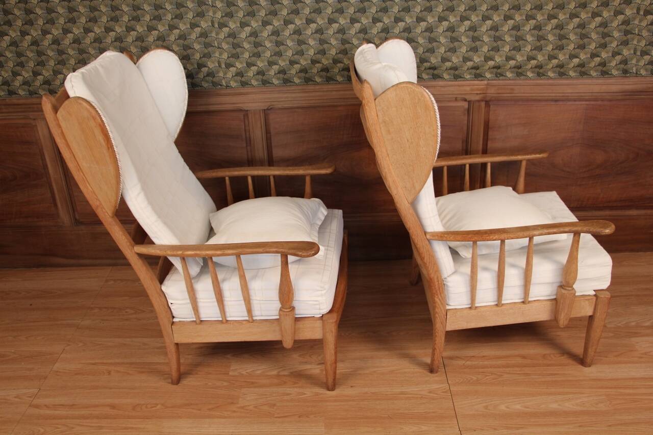 Pair of armchairs with ears of the 50s in oak