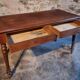Antique French writing desk in oak with two drawers, 1920s.
