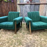 Duo of vintage armchairs with green fabrics.