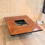 Coffee table in walnut magnifying glass forming bar by Paul Michel