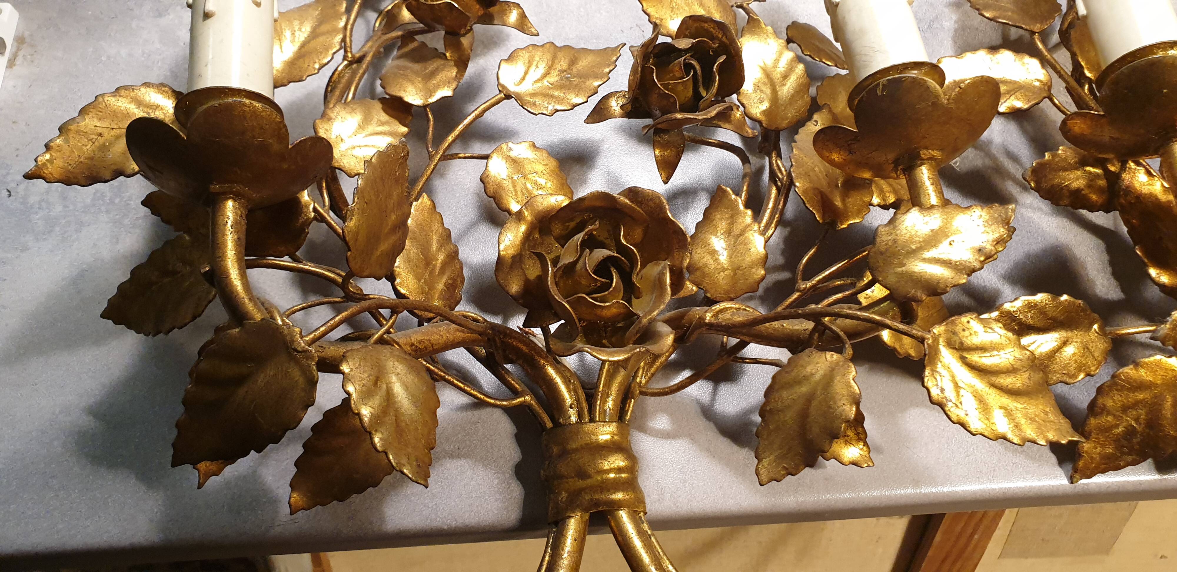 Pair of gold metal wall lights