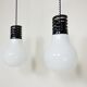 Pair of suspensions form glass by S.T.L. Studio for Lamperti bulb