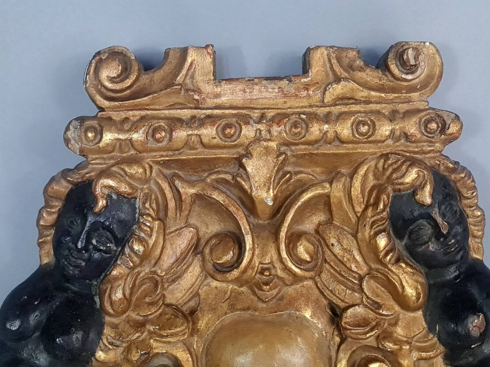 18th century carved wooden element, a cartouche surrounded by two women C478