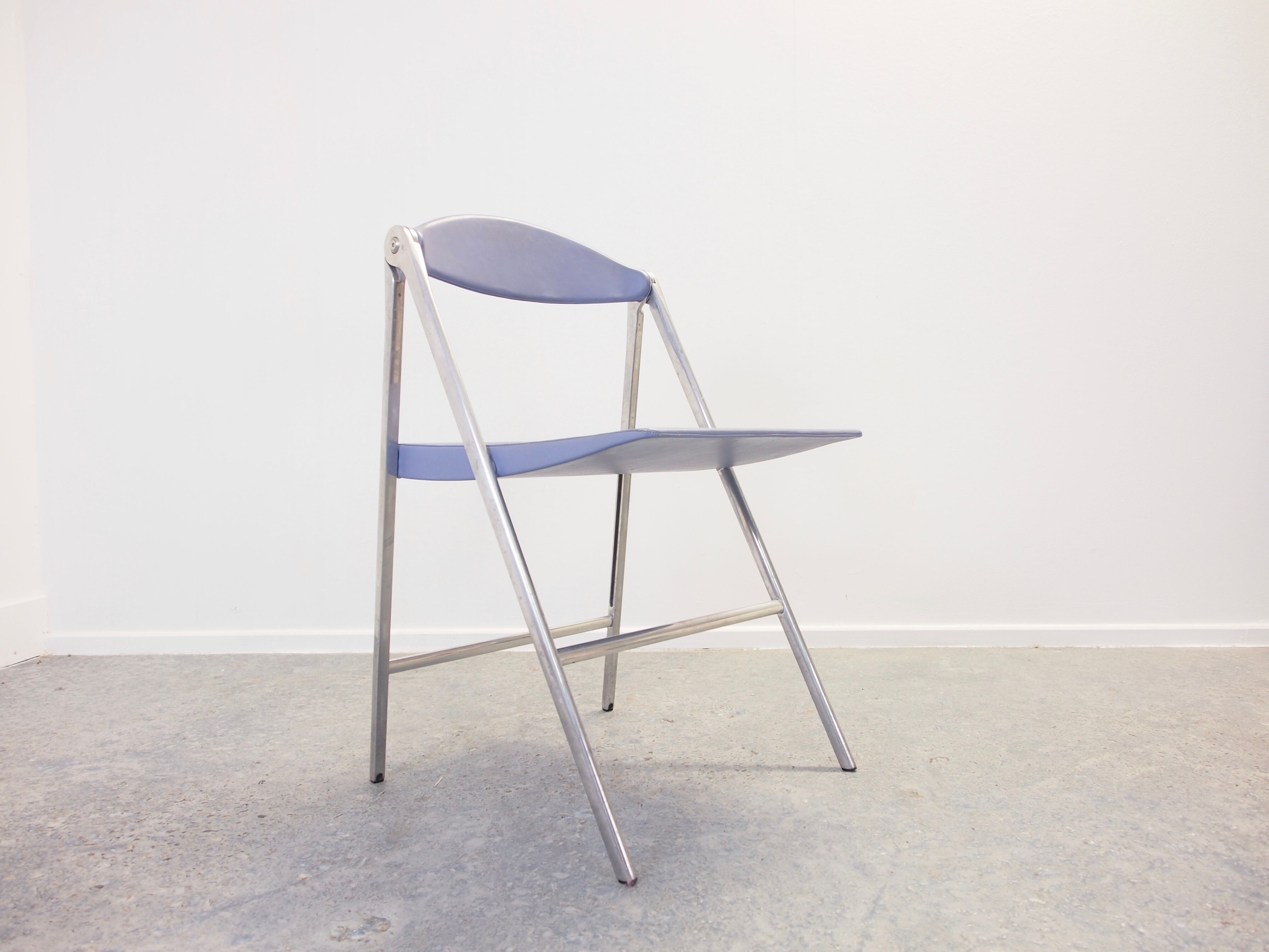 Folding chair "Donald" by Studio Cerri & Associati for Poltrona Frau