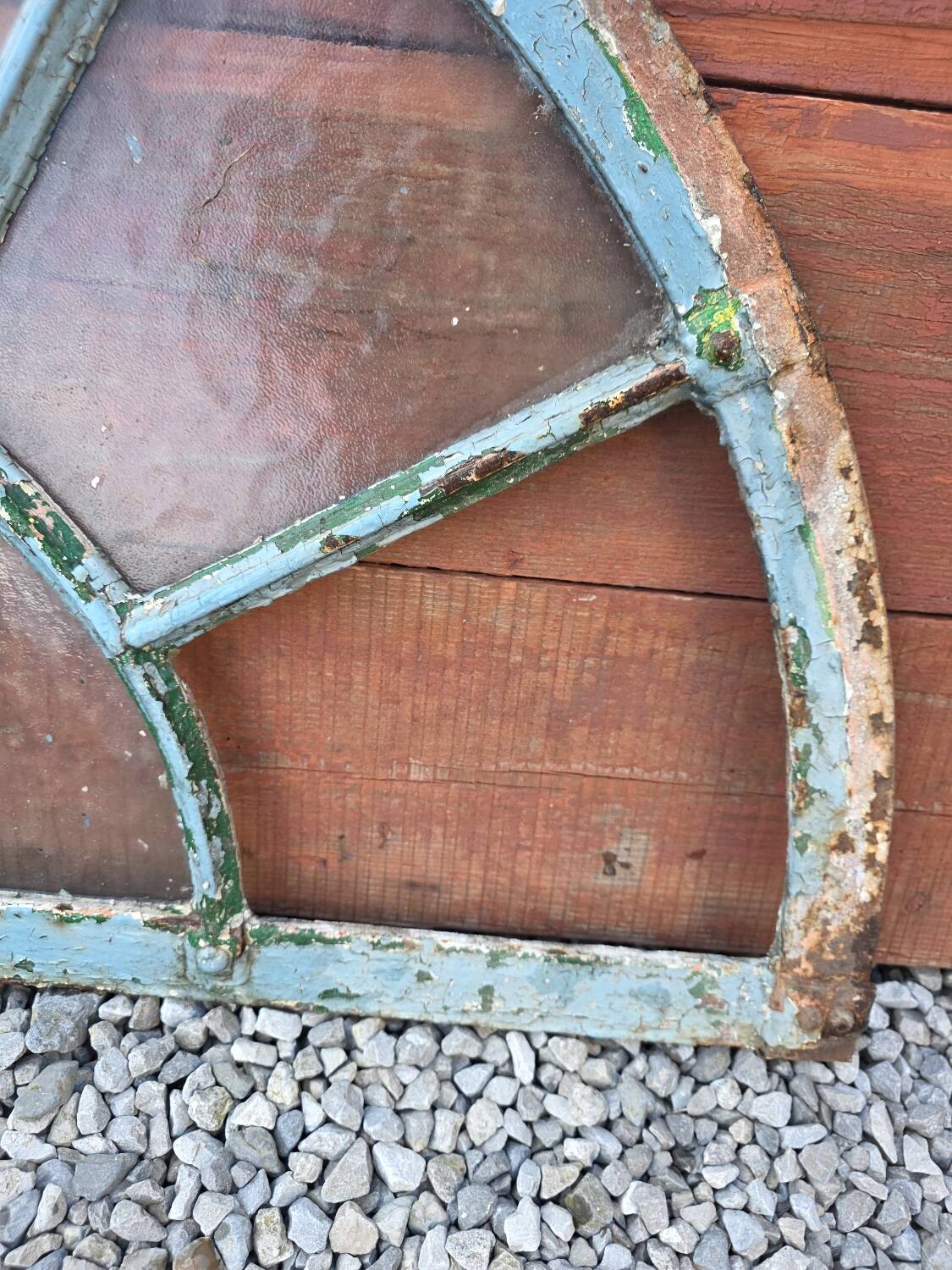 Old wrought iron full riveted gates from the 19th century.
