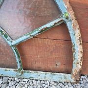 Old wrought iron full riveted gates from the 19th century.