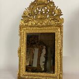 Miroir régence en bois sculpté doré début XVIIIème siècle