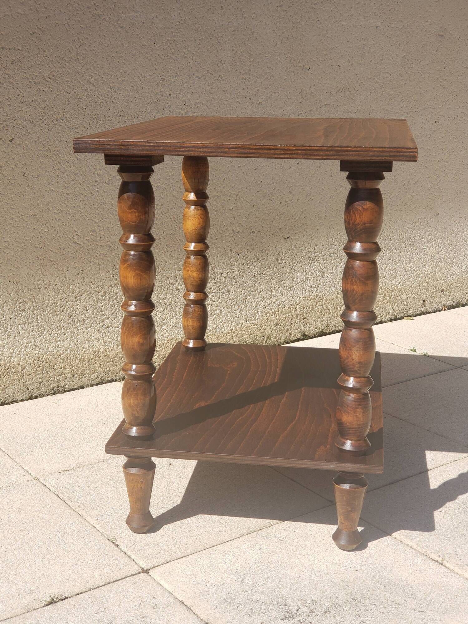Vintage wooden console side table with turned legs.