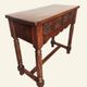 Castilian console table in carved walnut, early 20th century.