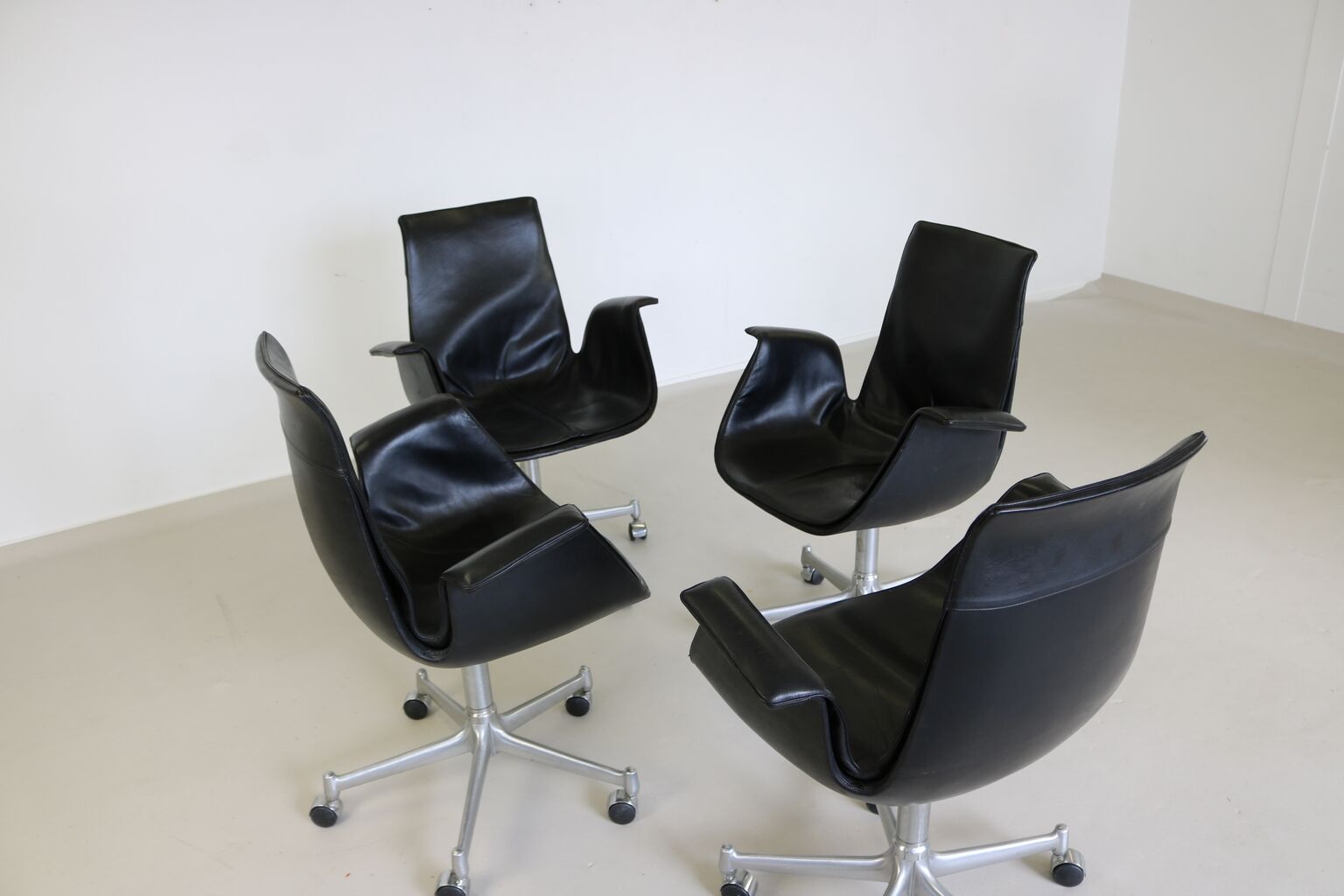 Group of four tulip armchairs for Kill International