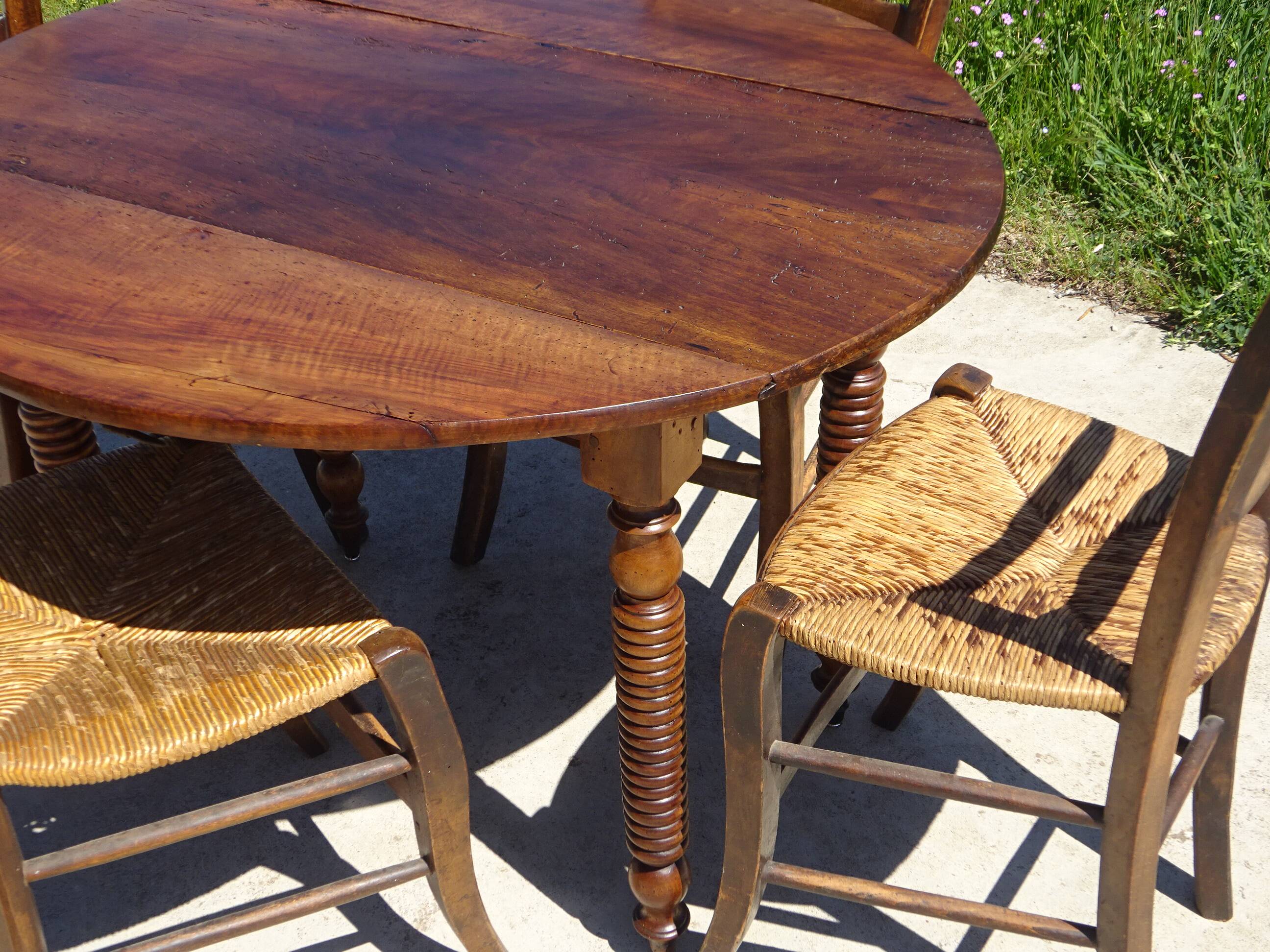 Antique walnut console table with honey spoon legs.