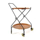 Trolley with loose round trays in the style of Jie Giantofte