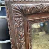 Large carved wooden mirror