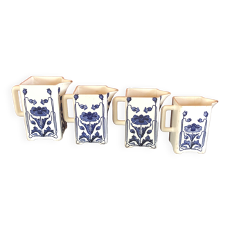 4 cobalt blue milk jugs