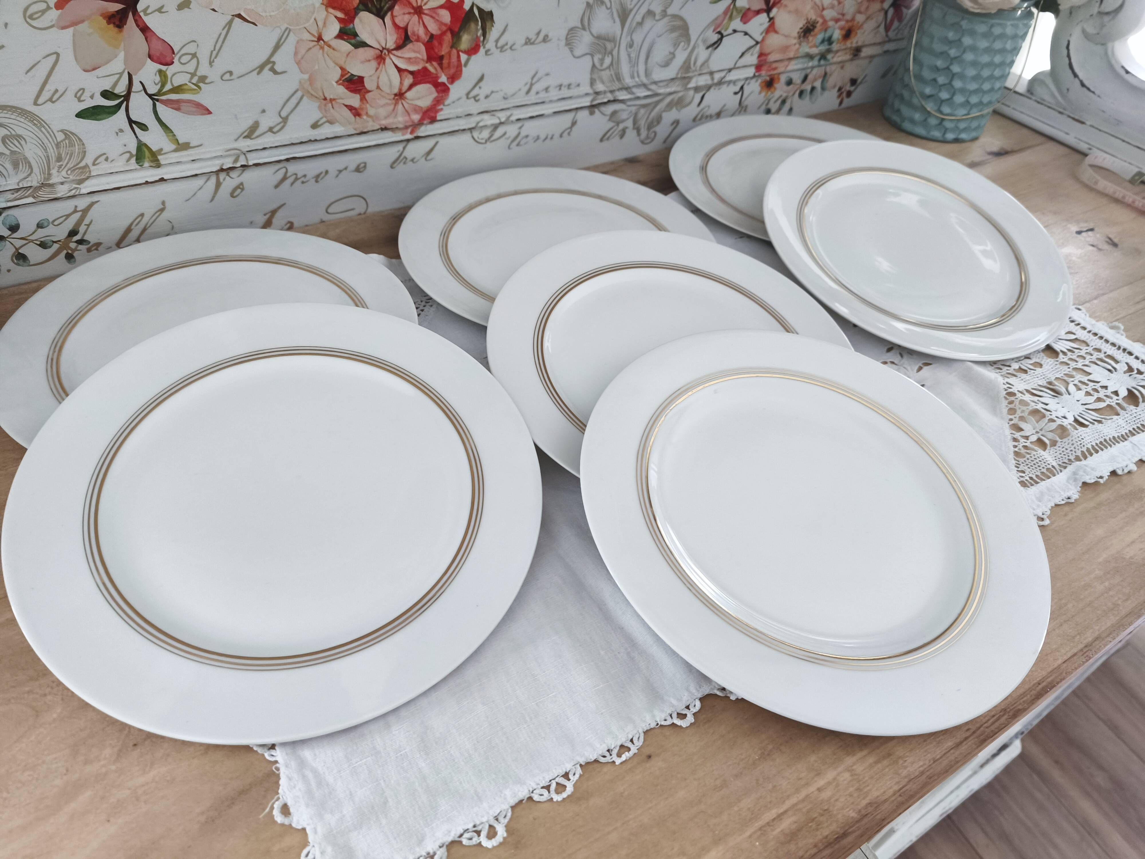 Set of 7 Limoges porcelain dinner plates from Maison Charles Ahrenfeldt