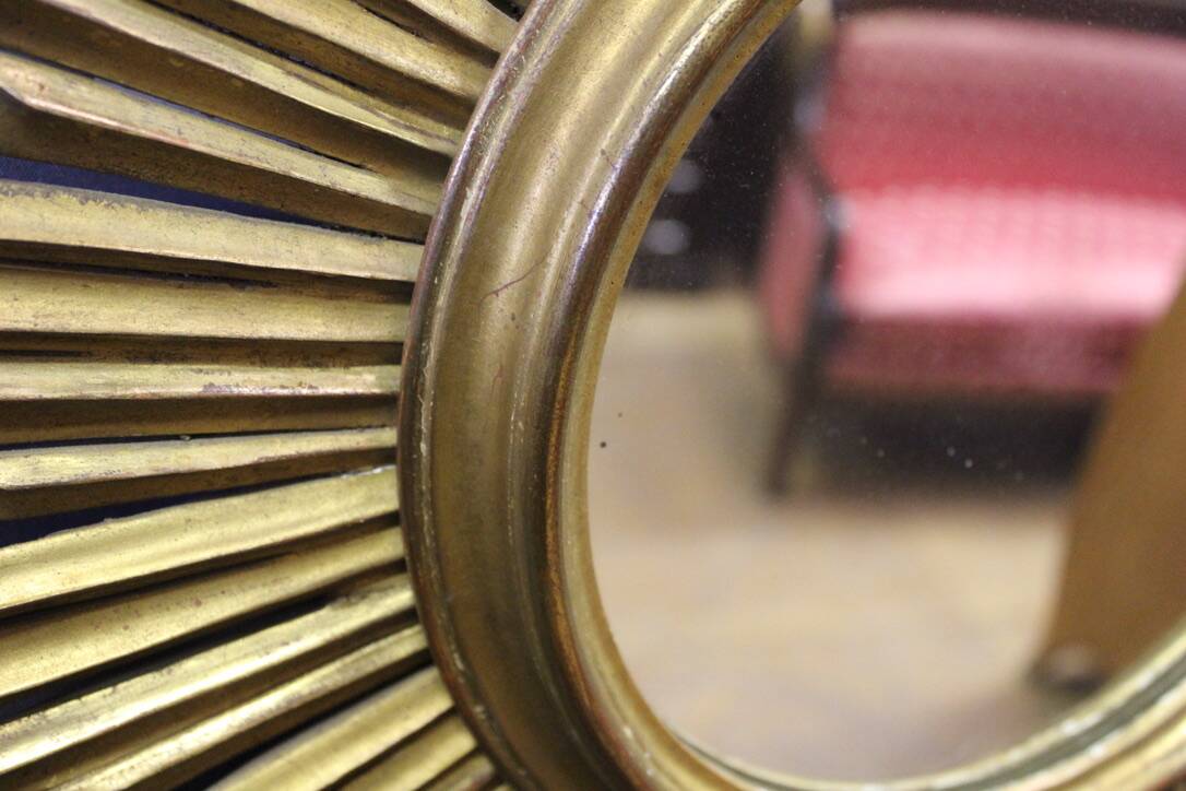 Sun mirror in gilded wood circa 1970