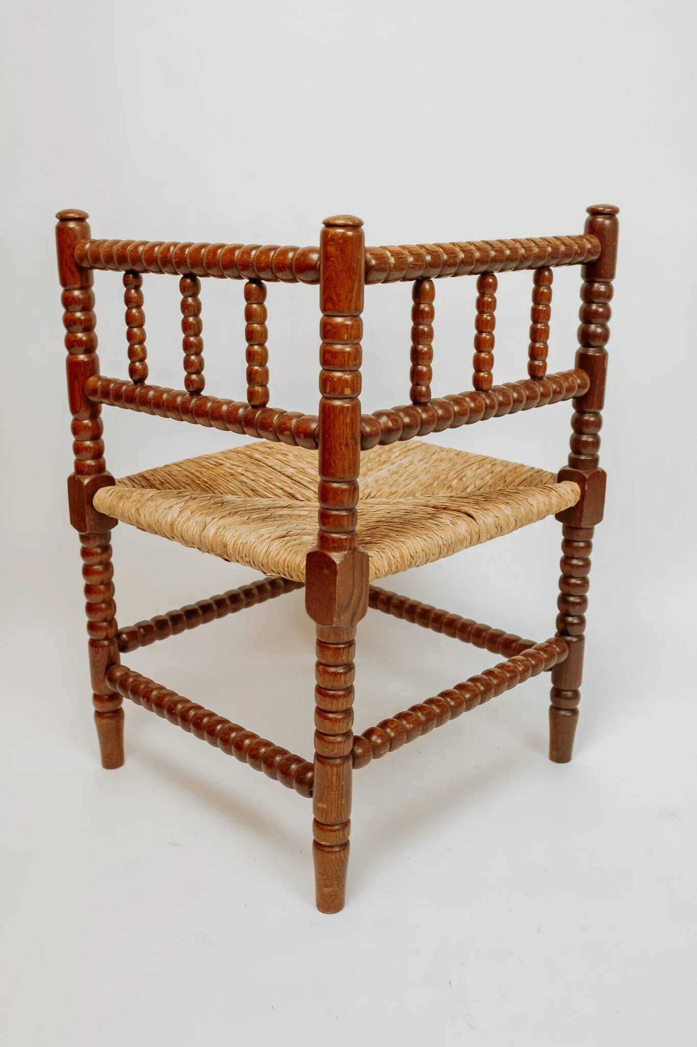 Classic vintage bobbin corner armchair
