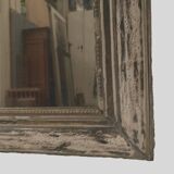 Louis Philippe mirror in wood and patinated stucco 19th century