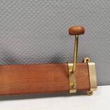 Danish teak and brass coat rack with adjustable hooks, 1960s.