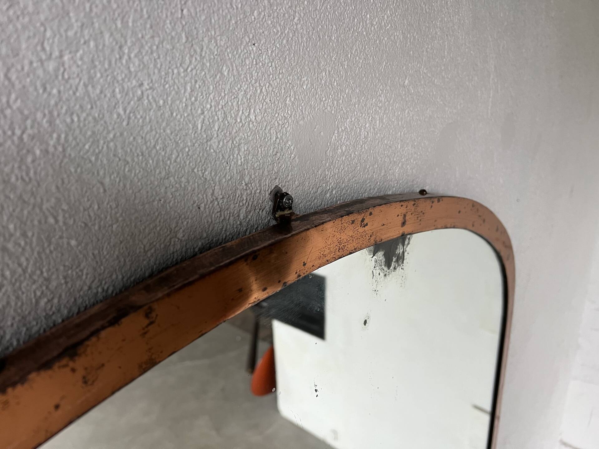 Large antique mercury mirror in copper-plated metal, 1930