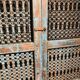 Openwork indian door in metal and blue wood
