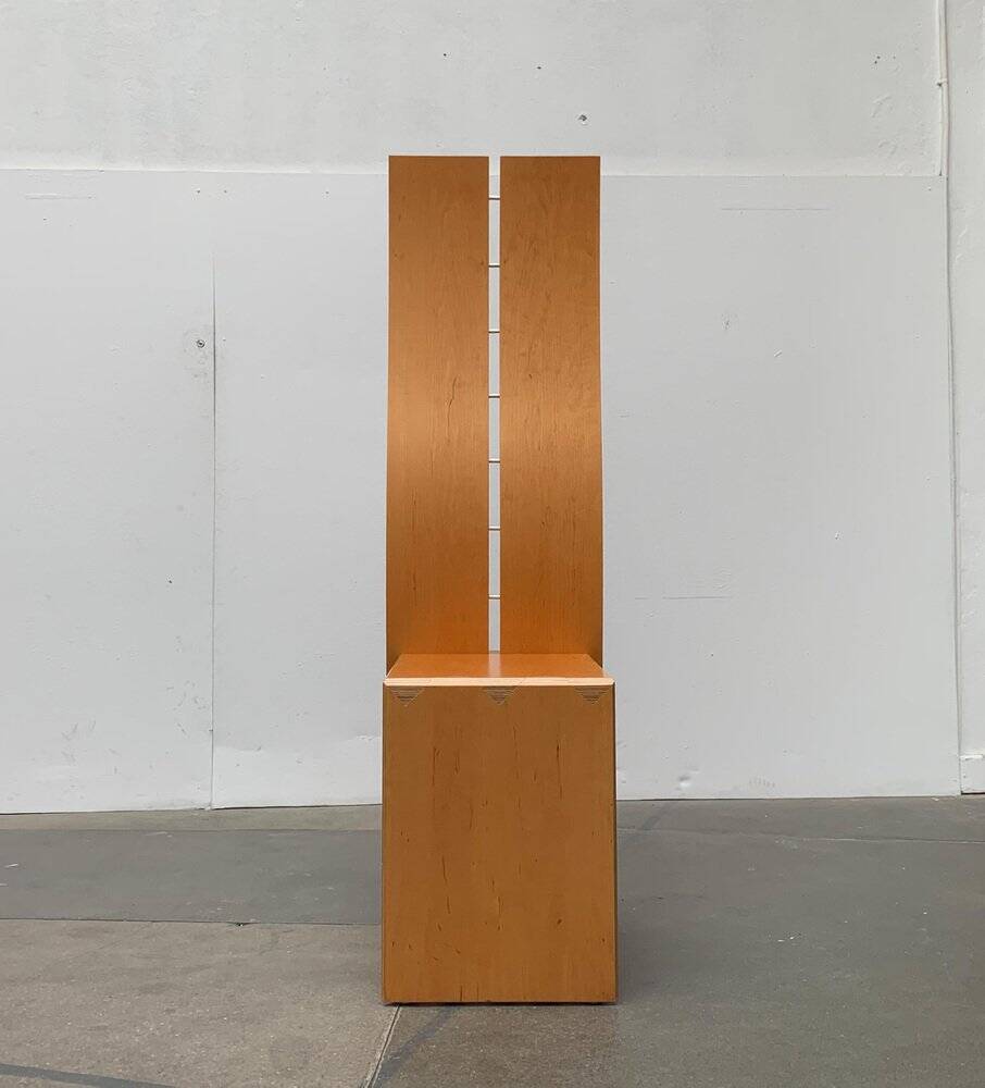 Postmodern chair with a high backrest