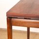 Danish extendable dining table in rosewood and brass by Poul Volther