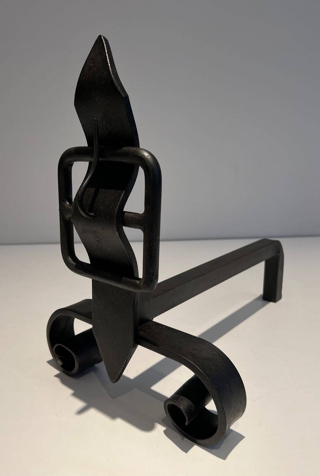 Pair of Wrought Iron Andirons with Obelisk and Belt Motifs