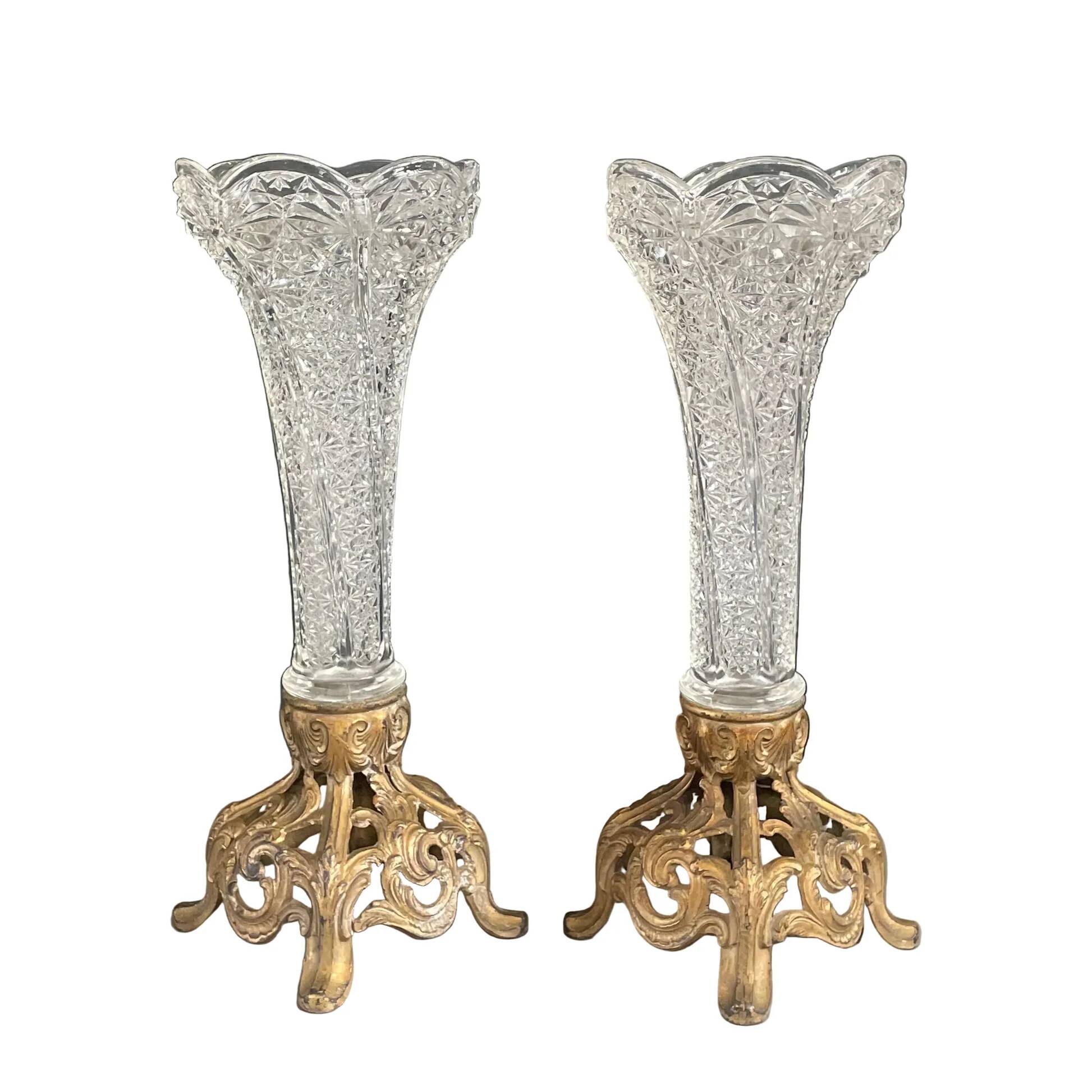 Pair of candlesticks in spelter and moulded glass
