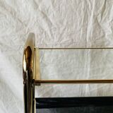 Magazine rack, saddle on vintage wheels